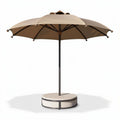 Outdoor patio umbrella with beige canopy and heavy base for stability